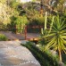 Sandstone and white pebble garden path design