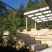 Timber pergola and sandstone walling